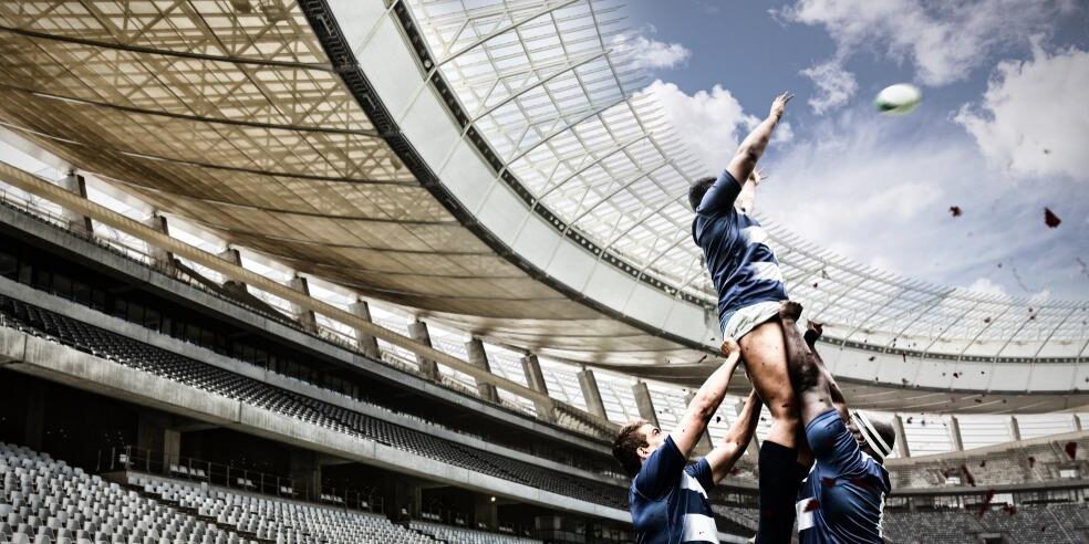 Strong,Rugby,Players,Against,Rugby,Stadium,In,The,Morning